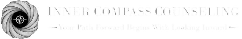 Faded text reading 'COMPAS' with unclear smaller text below.